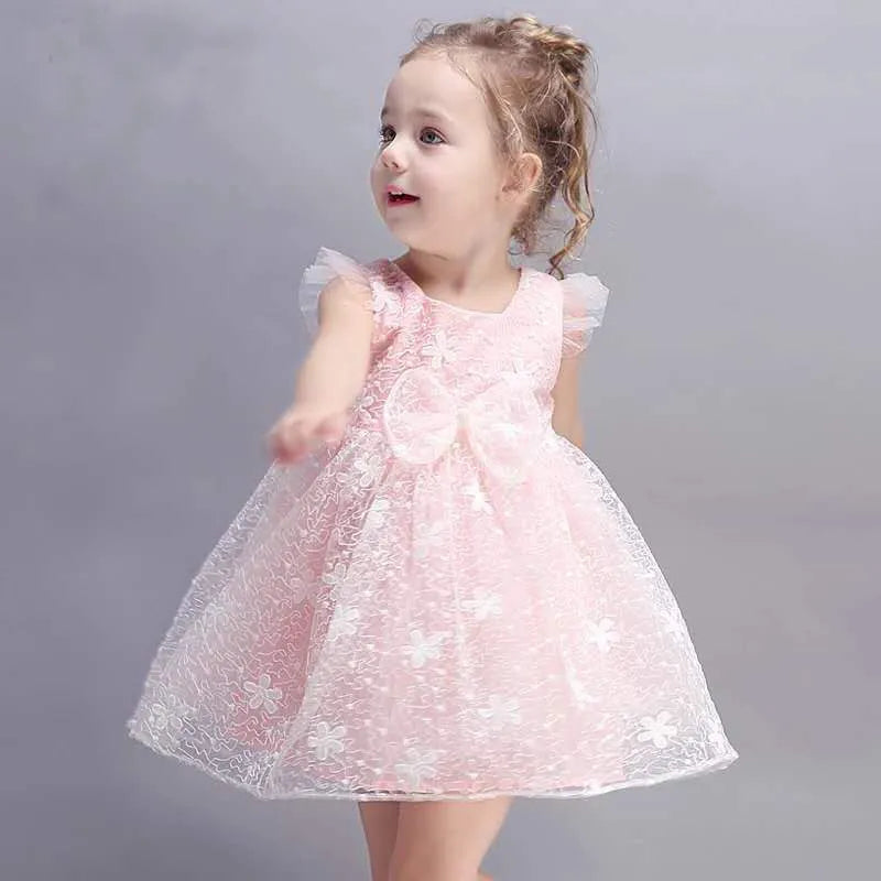 Baby girl with pink on sale dress